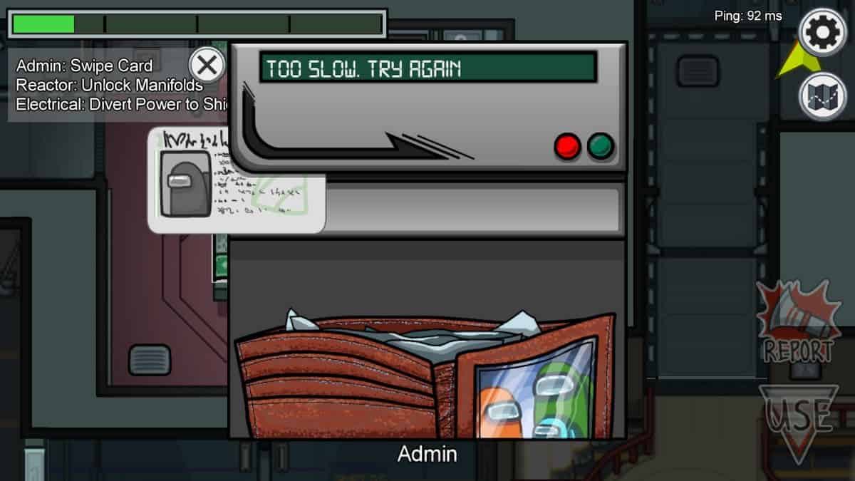 A wallet near a keycard in Among Us.