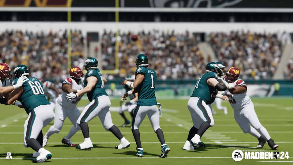 Image of Madden 24 Game. Philadelphia Eagles in green against the Washington Commanders in red and white. Jalen Hurts throwing a pass.