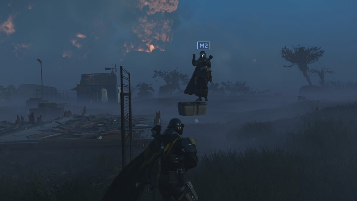Helldivers 2 screenshot of Helldivers with one standing on a levitating box