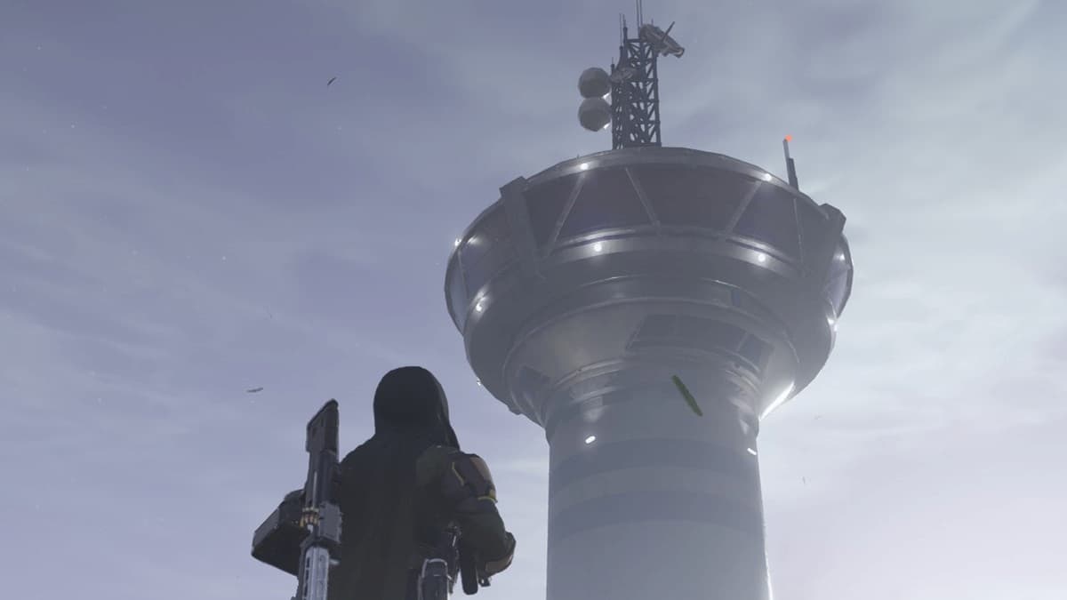 Helldivers 2 screensot of a Helldiver looking up at a tower