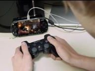 You CAN use a DualShock 3 with Resitance: Retribution on a PSP-1000