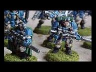 Warhammer 40,000: Squad Command marching towards DS and PSP