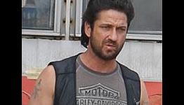 Gerard Butler sports some righteous hair as ‘Machine Gun Preacher’