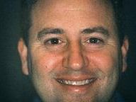 Giant Mark Rein Face Says: "PS3 Benefitting from Gears of War"