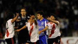 Argentina Soccer: Boca Juniors and Racing Soar, As River Plate Is Robbed at the Death