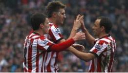 Wenger predicts Bendtner sale