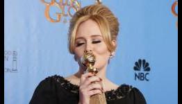 Adele walks away with a Golden Globe Award for Skyfall