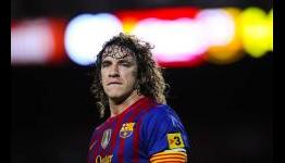 Puyol signs Barcelona contract extension until 2016