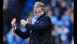 Manchester United will falter in title race, insists Mancini