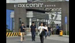 Foxconn says to boost China worker participation in union