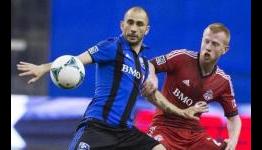 Montreal holds off New York to stay perfect