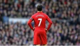 Liverpool fine Suarez, deny plans to sell