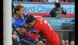 Suarez charged by Football Association over Ivanovic bite