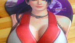 The Dead Or Alive 5 mousepad I can’t resist but am ashamed to have on my desk