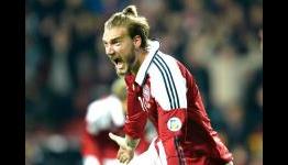 Bendtner: I want to play for Real Madrid or Barcelona next