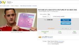 You can now buy a picture of a man holding a picture of an Xbox One