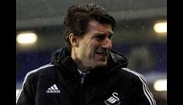 Swansea part company with Laudrup