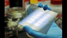 Solar electric generating spray that can be applied to windows that still allows light in