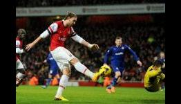 Wenger hints Bendtner set for Arsenal exit