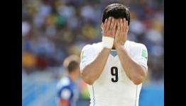Suarez on bite: My teeth fell onto his shoulder