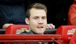 Brendan Rodgers says Simon Mignolet has been taken out of the firing line for the time being