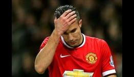 Manchester United to assess Van Persie ankle injury