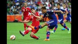 Japan 2-0 Jordan: Honda and Kagawa secure top spot