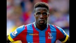 Zaha has been damaged by Manchester United – Pardew