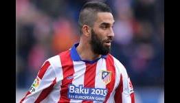 Arda Turan denies signing for Barcelona