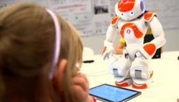 Kids and robots learn to write together