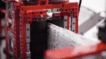An awesome person made this automatic Lego paper airplane machine