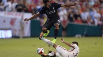Liverpool 1-2 Roma: Mohamed Salah and Edin Dzeko goals earn Serie A side friendly win