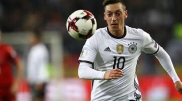Arsenal star Ozil misses training with back injury