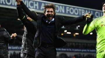 Antonio Conte gets a soaking after Chelsea title win