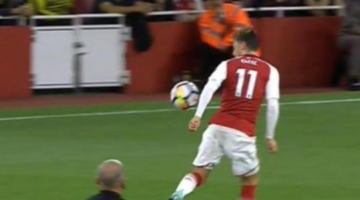 Lucky? Ozil got away with blatant handball moments before Arsenal equaliser