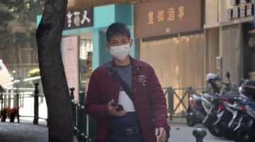 A facial recognition firm says their AI can identify people even if they’re wearing face masks
