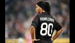 Tottenham in Champions League boost as Ronaldinho cast off by AC Milan