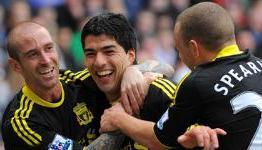 Suarez underlines Reds title aim