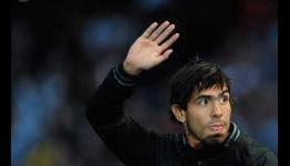Mancini says Carlos Tevez will still play for Manchester City & does not expect Balotelli to leave
