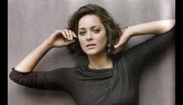Is Marion Cotillard’s ‘Dark Knight Rises’ Character Who You Think She Is?