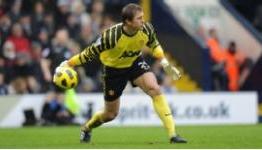 Kuszczak hits out at Man Utd