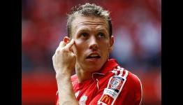 Racism probe launched after Liverpool star Bellamy taunted by Brighton fans