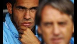Roberto Mancini says Carlos Tévez can play for Manchester City again if he apologises for conduct