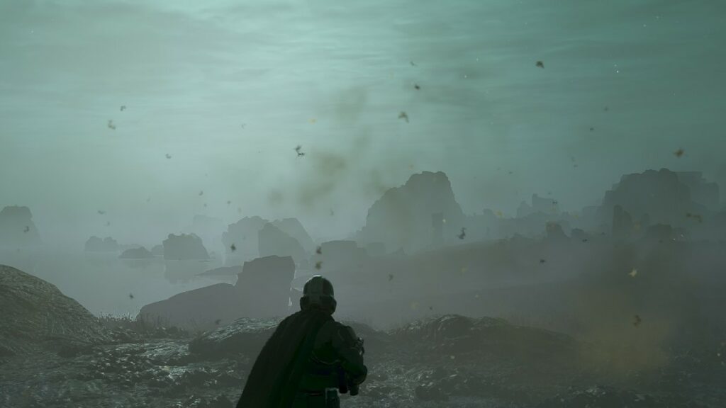 Helldivers 2 players looking at a misty wasteland
