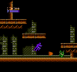 Image showing a screenshot of the 1989 NES Batman Game. Showing Batman traversing through a 2D Platform game